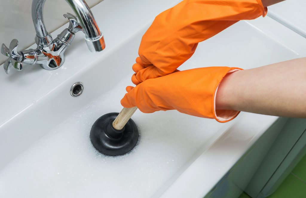 how-to-unclog-a-clogged-sink-with-a-plunger